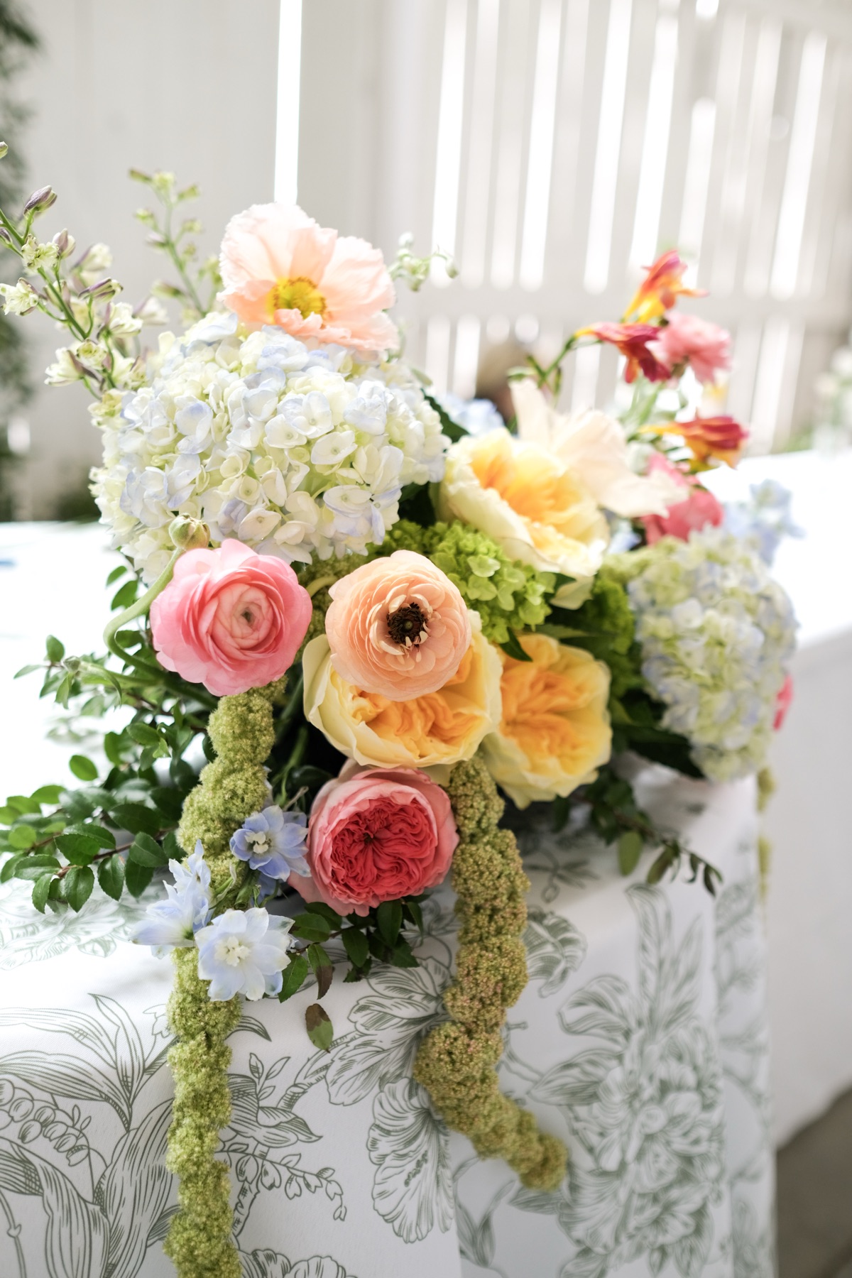 Colorful floral bouquet on a lace tablecloth