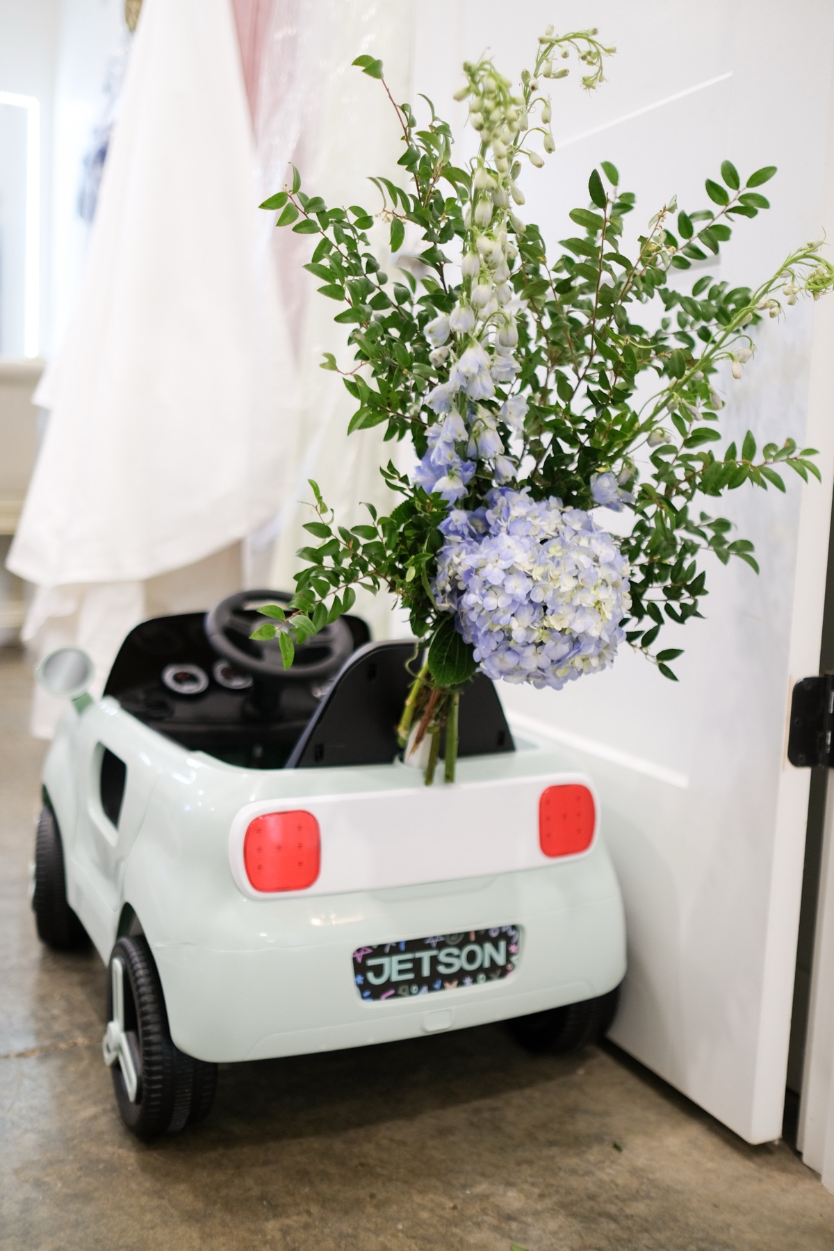 Flower-decorated wedding getaway car